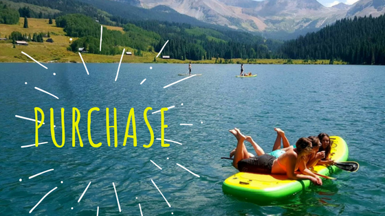 a group of people in a boat on a body of water